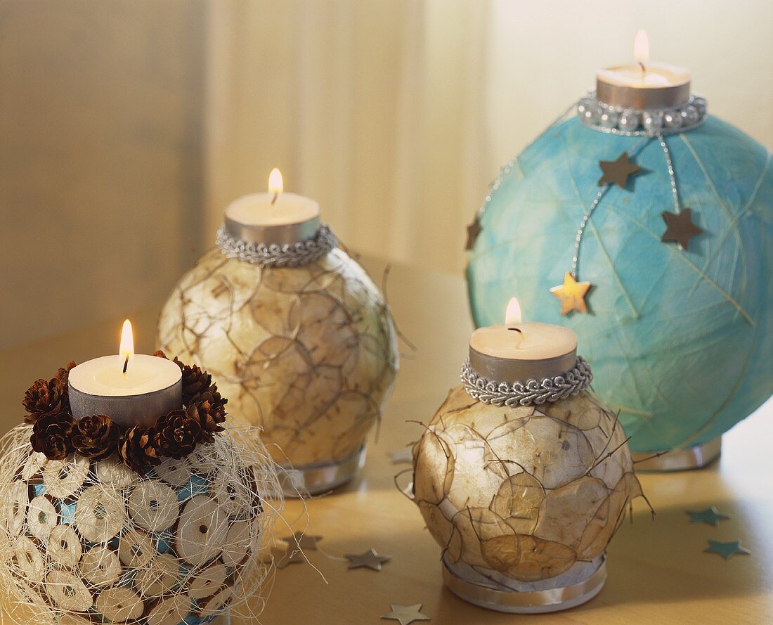 Tea lights on decorated baubles