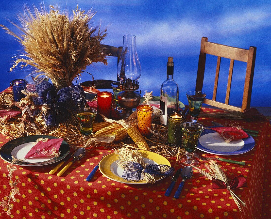 Bunch of cereals on table with autumn decorations