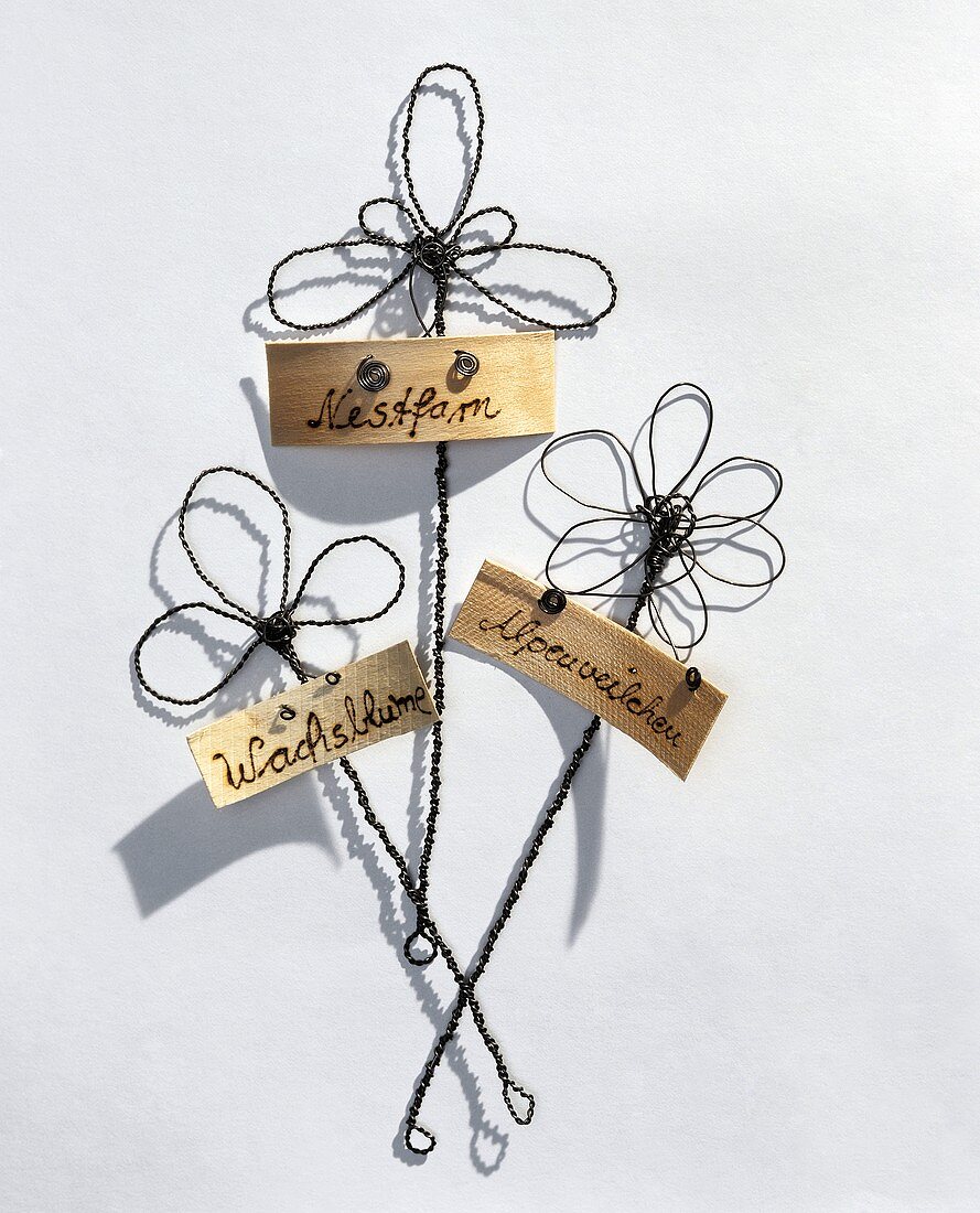 Plant labels with wire flowers