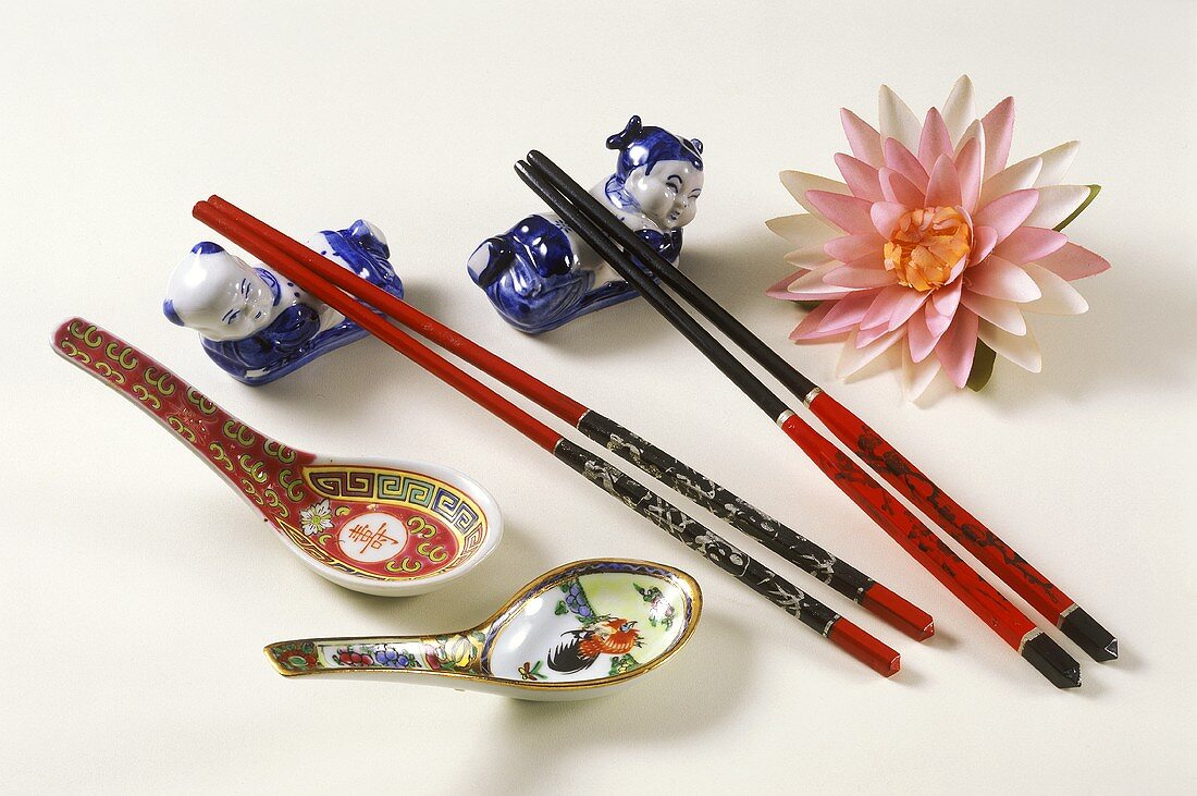 Asian chopsticks with chopstick holders and soup spoon
