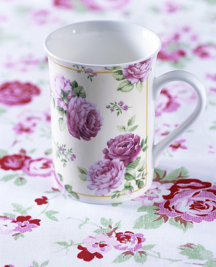 Cup with rose decoration