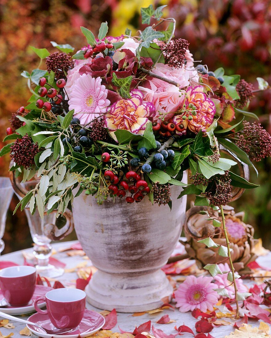 Gerbera, roses & rose hips, carnations, Hedera - ivy, Skimmia