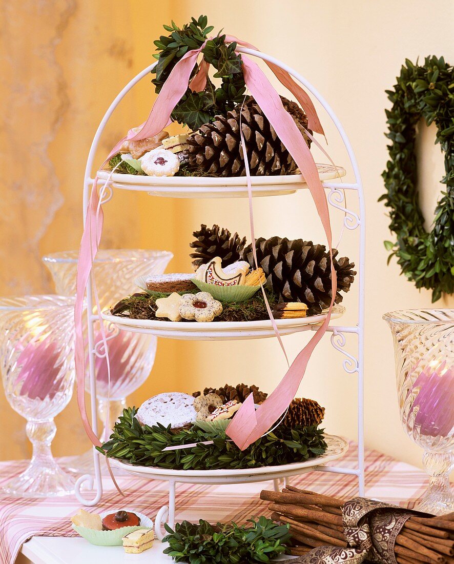 Tiered stand with cones, wreathes and biscuits
