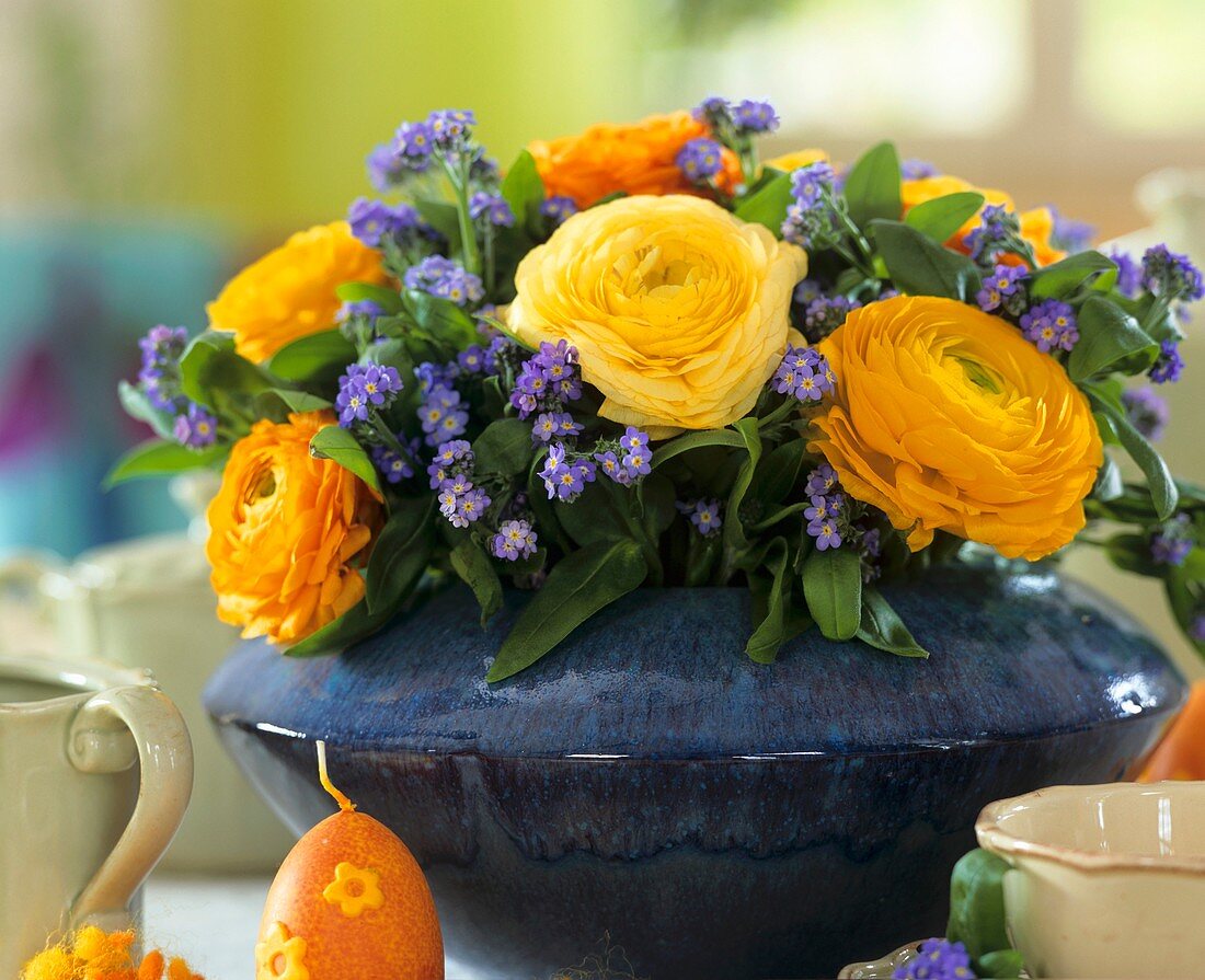 Arrangement of Ranunculus and forget-me-not