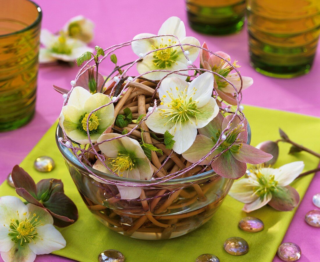 Christmas and Lenten roses in ball of willow twigs