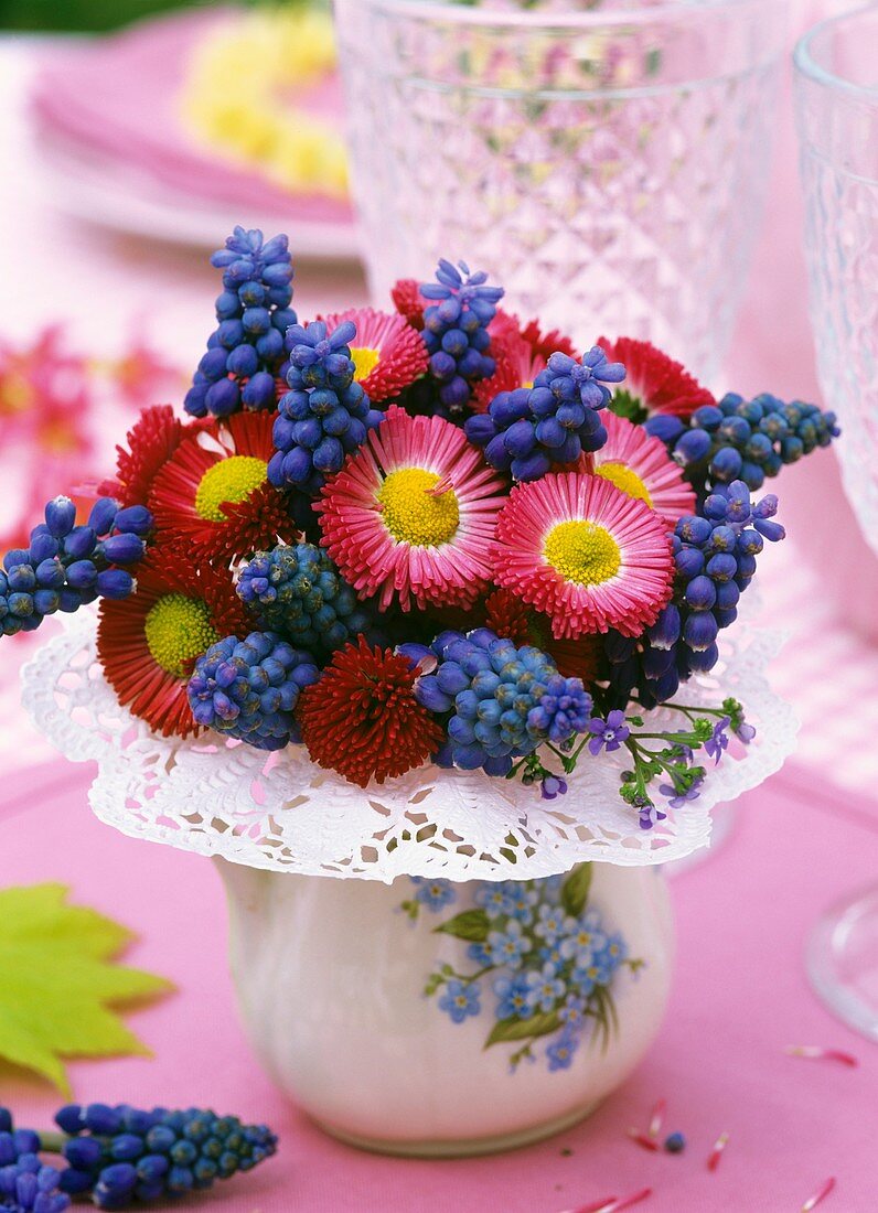Posy of daisies and grape hyacinths