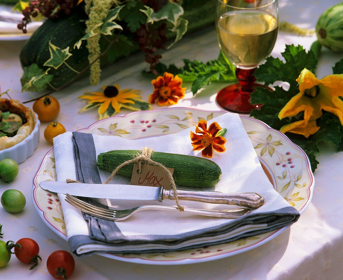 Autumnal place setting with courgette
