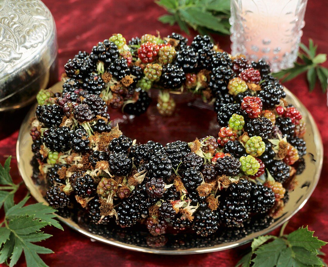 Blackberry wreath on gold plate