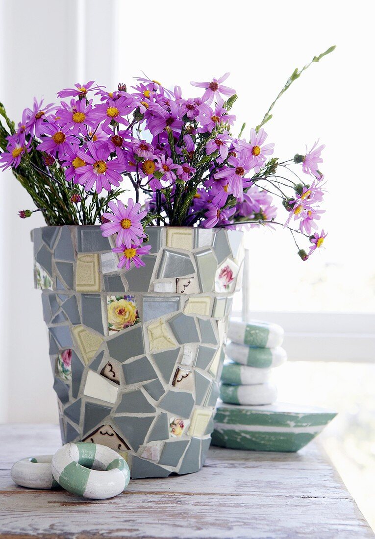 Flowers in mosaic vase