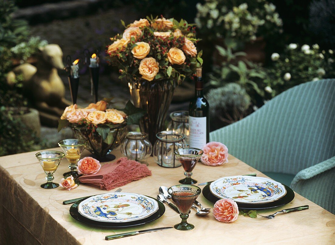 Table laid for two in a garden