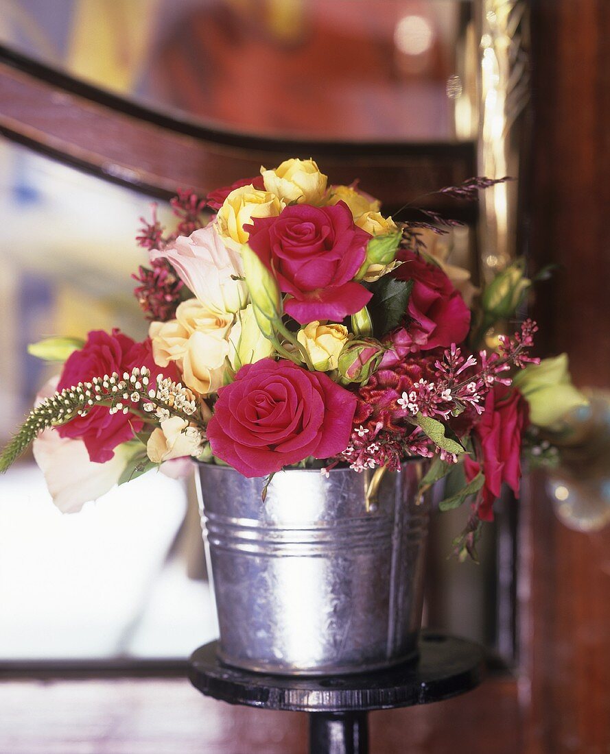 Bouquet of roses in a bucket