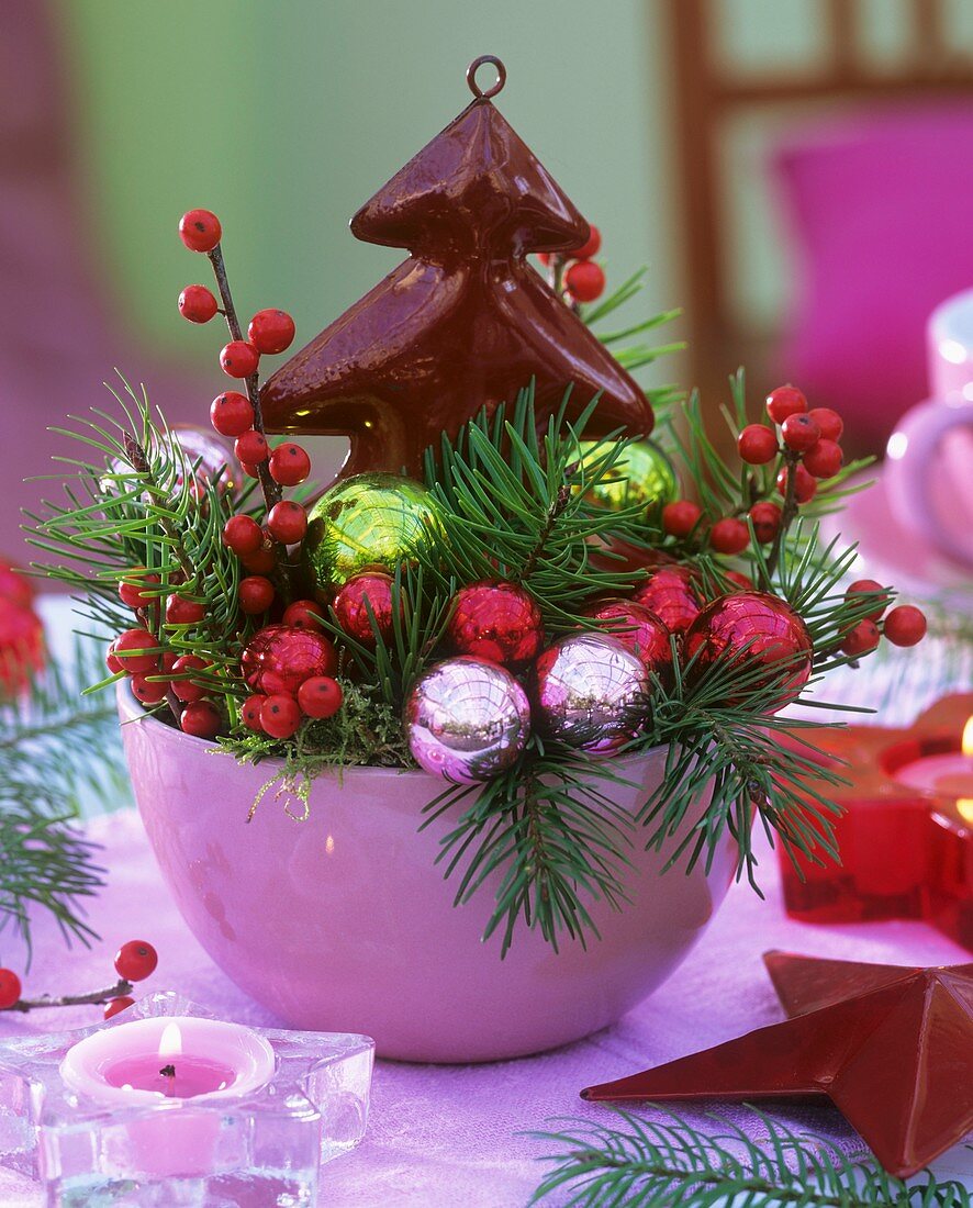 Christmas arrangement of Douglas fir and winterberries