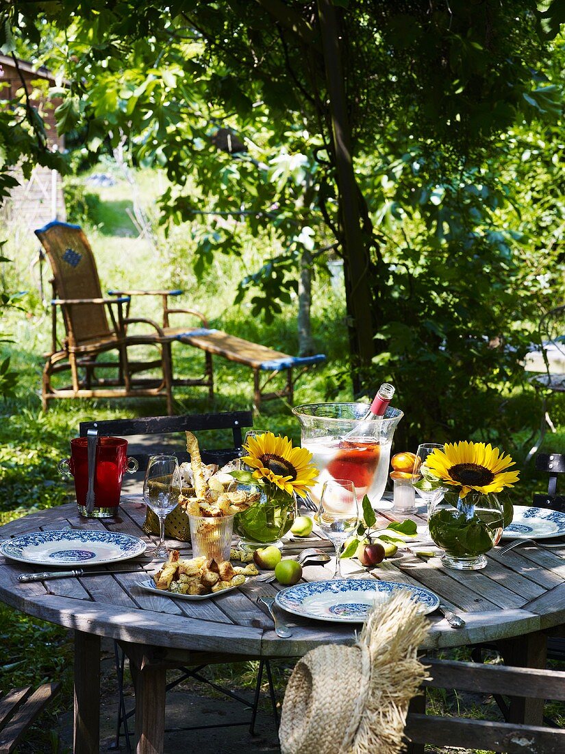 Laid table in garden (summer)