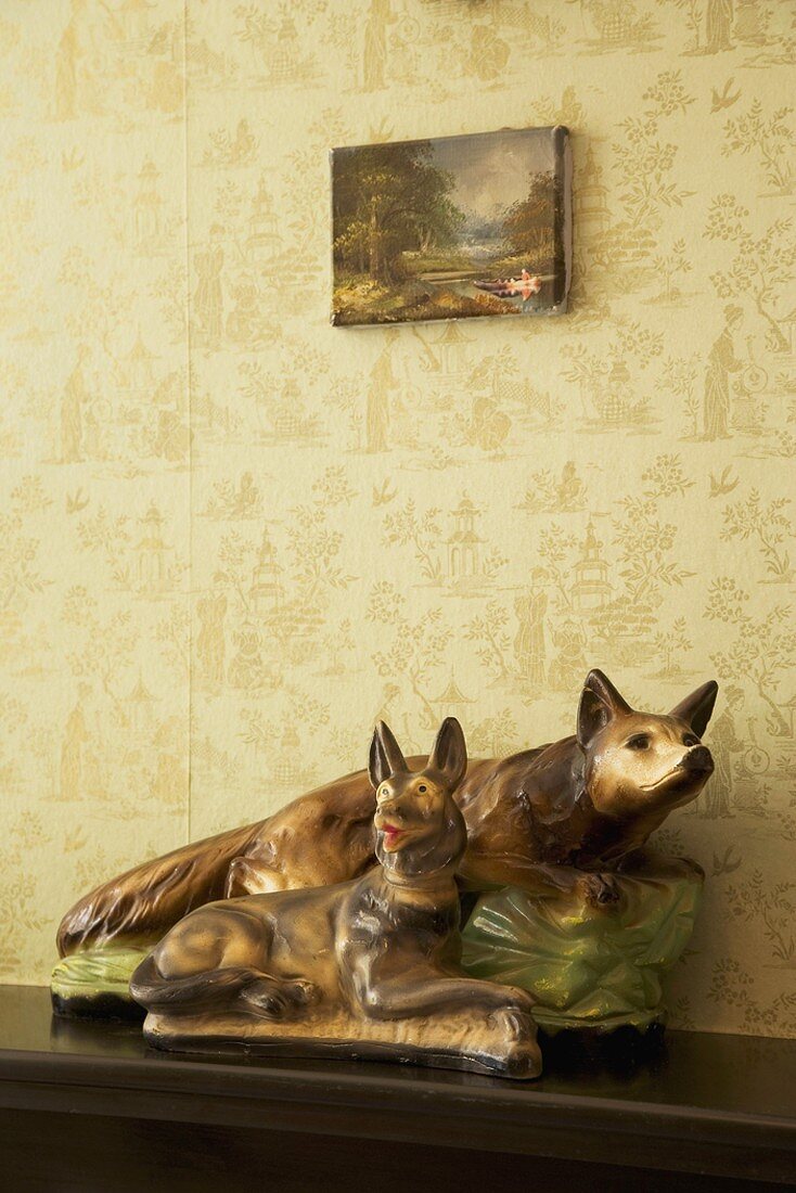 Dog figurines on sideboard