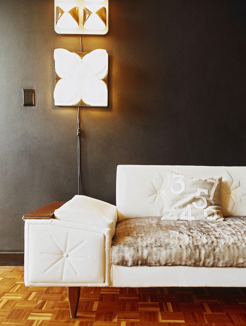 Sofa and wall lamps