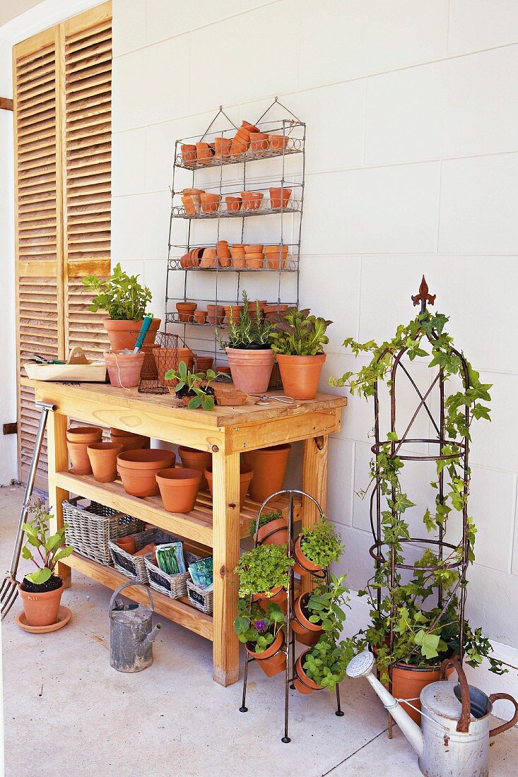 Plant table with flowerpots