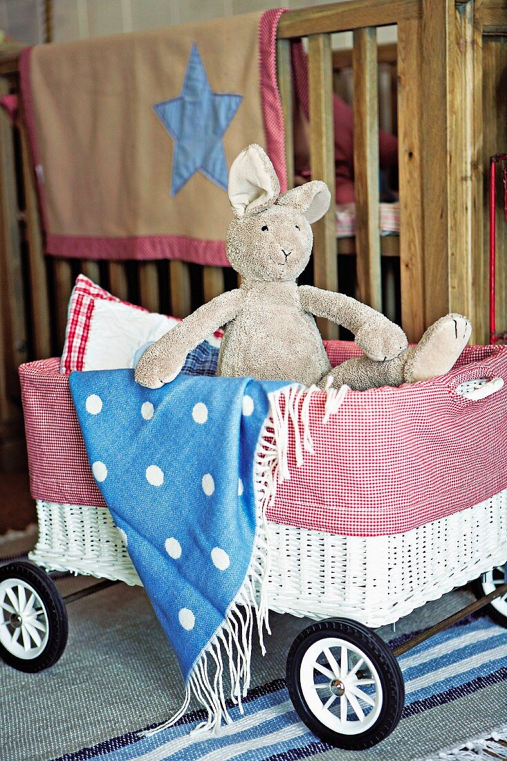 Plush bunny & blanket in toy pram