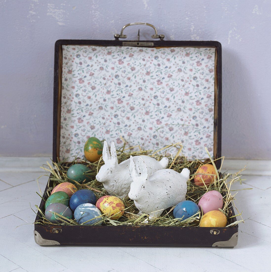 Easter eggs and bunnies in a suitcase