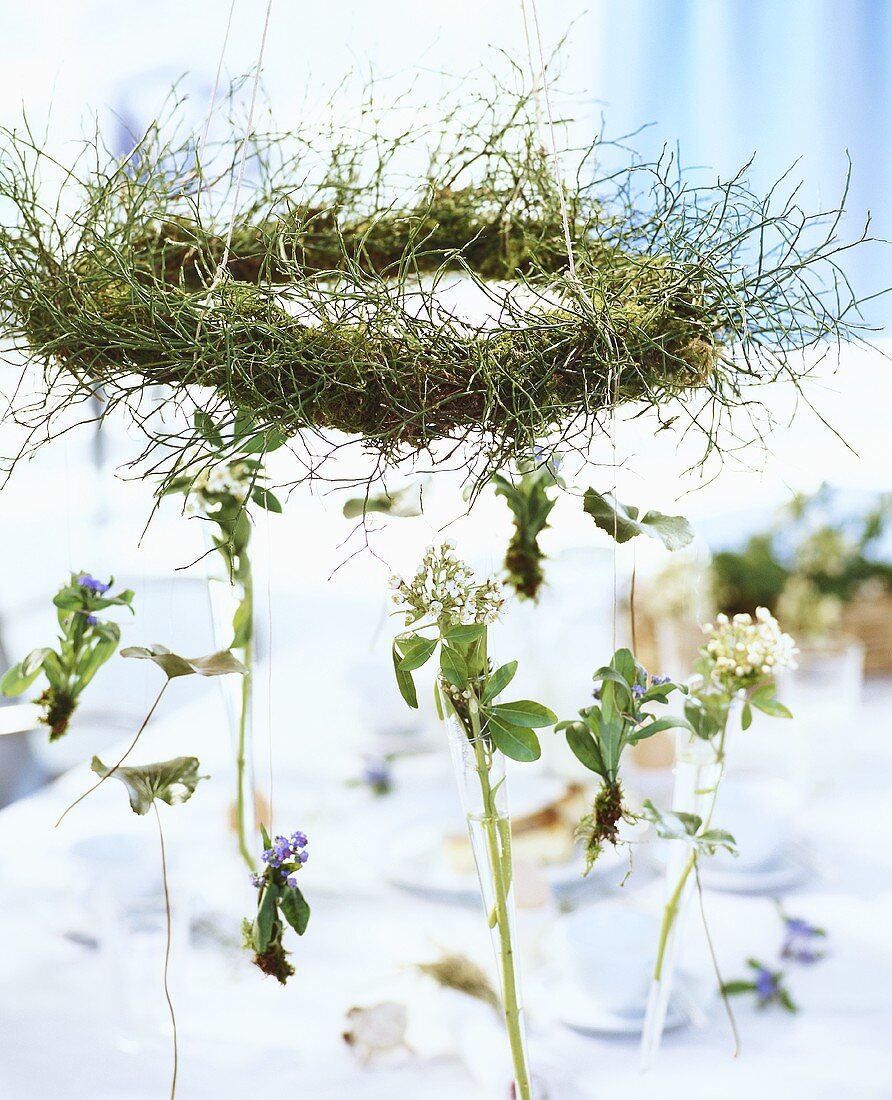 Forget-me-nots & flowering twigs hanging on wreath