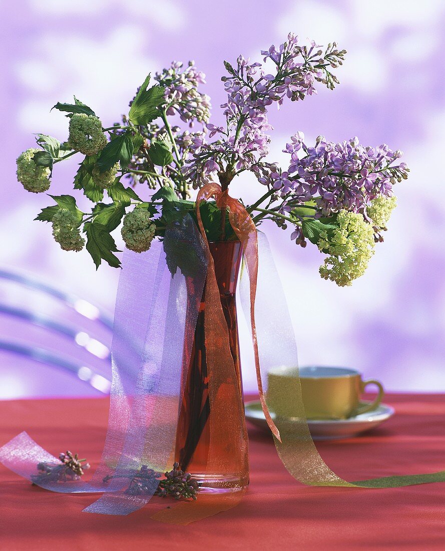 Vase of lilac and Viburnum