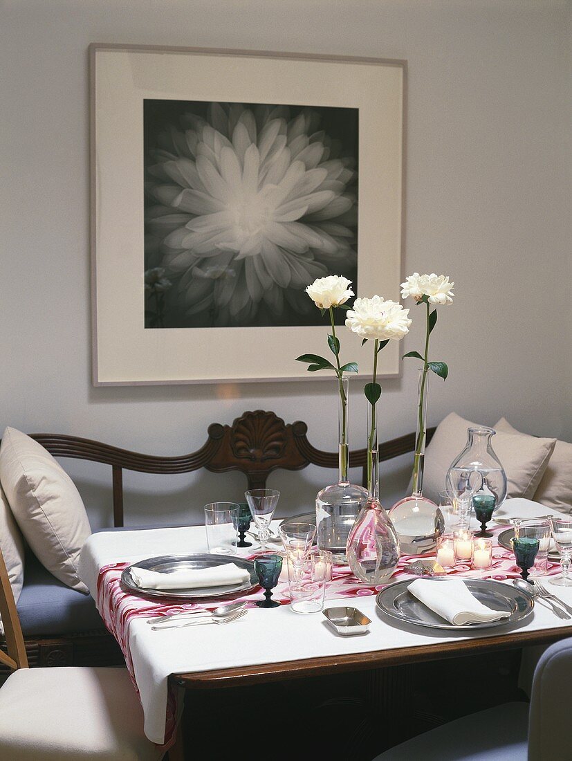 Laid table with flowers and candles