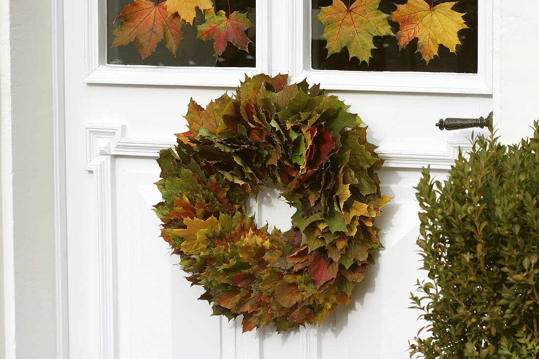 Door wreath of autumn leaves
