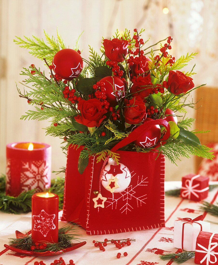 Arrangement of roses in a felt bag (Christmas decoration)