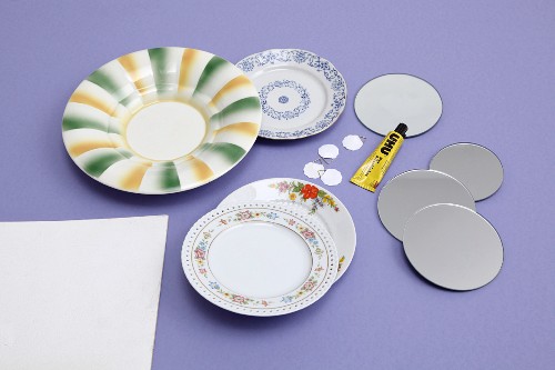 Decorative wall plates made from old china, round mirrored coasters and premade eyelets