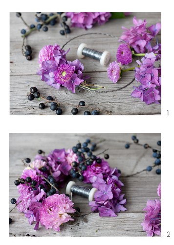 Tying a wreath of pompom dahlias, hydrangea florets and sloes