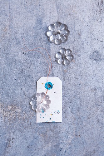 Glass flowers and a label for decorating presents