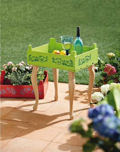 DIY tray table made from old fruit crate painted lime green