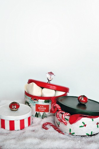 Old biscuit tins given new festive designs