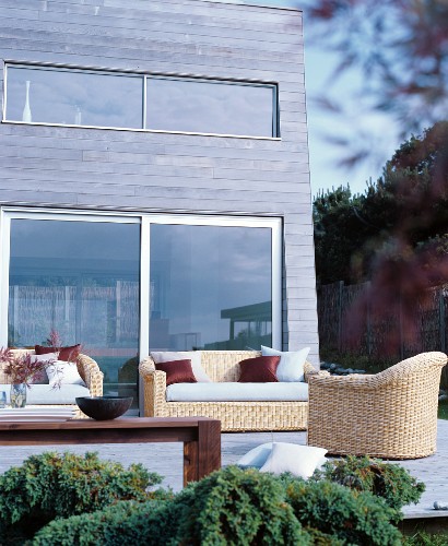 Comfortable Wicker Furniture On Wooden Image 12306816 Comfortable Wicker Furniture On Wooden