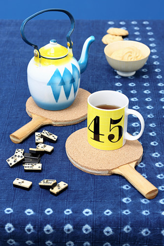 Table tennis bats used as coasters