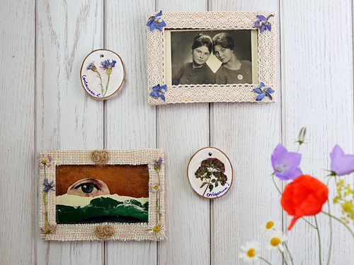 Picture frames decorated with pressed flowers and ribbon