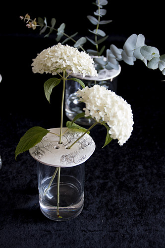 Hydrangeas in vase with perforated lid made from modelling clay