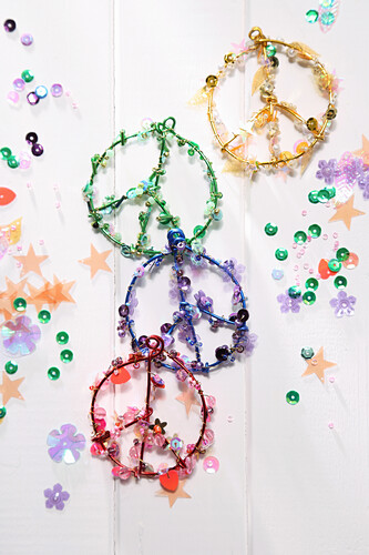 Colourful peace glitter pendants