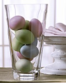 Easter eggs in glass vase