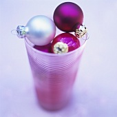 Christmas baubles in a glass