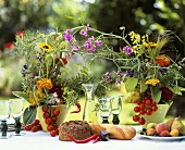 Summery floral decoration with vine tomatoes