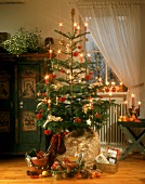 Presents under Christmas tree in a room