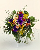 Colourful bouquet of anemones and other flowers from above