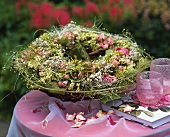 Pink roses and gypsophila forming a wreath