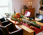 Autumnal dining table decorated with pumpkin and a long bamboo stem