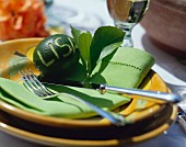 Table setting with lime place card & lime-green napkin