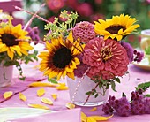 Vase of late summer flowers (sunflowers and zinnias)