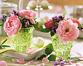 Pink roses and lavender in green cut glass vases