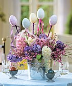 Easter arrangement of hyacinths decorated with eggs