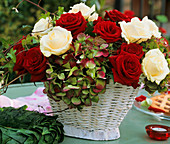 Basket of roses and hydrangeas