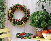 Wreath of cocktail tomatoes and chili peppers